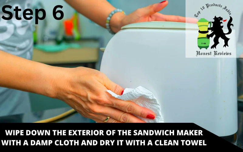 Wipe down the exterior of the sandwich maker with a damp cloth and dry it with a clean towel